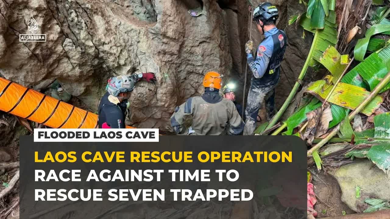 Rescuers race against time to reach seven trapped in flooded Laos cave
