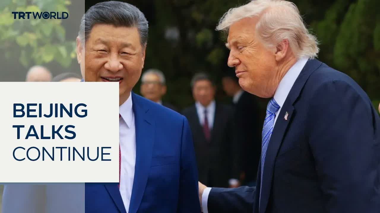 Trump and Xi strike cautious tone during Beijing talks